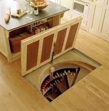Hidden lights in the banister lights up the staircase so the owners don't need any lights while walking up or down. Yes Please Spiral Wine Cellar Secret Rooms Dream House