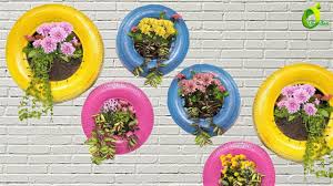 Stack one small and one large tire, and attach a plastic flower pot, paint them into lovely ladybird. Garden Decoration Using Old Tires How To Make Tyre Planters Diy Tyre Planter Organic Garden Youtube