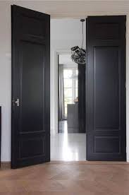 Dark Grey Navy Black Painted Interior Doors With Lighter Paint On The Walls And White Trim I Thin Grey Interior Doors Doors Interior Dark Interior Doors