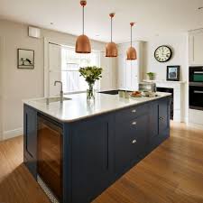 A mirrored kitchen island will look glamorous in even the most standard of kitchens. Navy Kitchen Ideas To Add An Element Of Rich Colour And Sophistication