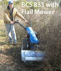 There are 45 different implements for the machine from plows, to mowers, to hay balers, to wood chippers. Earth Tools Walk Behind Tractors Professional Garden Tools