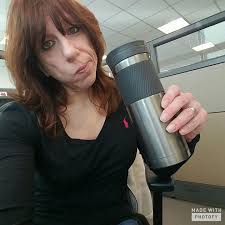 I love my new mug except it's a little small. Trouble wasn't happy to be in  the picture.