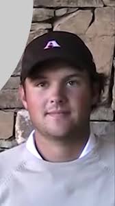 Patrick Reed Touches Sand in Bunker