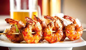 Heat the olive oil in a skillet over medium high heat, add shrimp and saute just until pink, about 2 minutes. Melt In Your Mouth Grilled Lemon Garlic Shrimp Prawn Recipes Marinated Grilled Shrimp Seafood Recipes