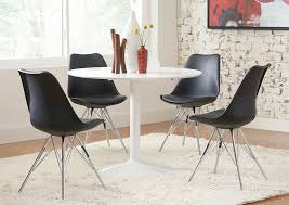 White wood kitchen table is the best kitchen furniture along with your white and elegance kitchen. White Round Dining Table W 4 Black Side Chairs Southern Furniture Co Inc