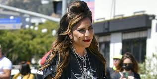 Show me a picture of lady gaga. Lady Gaga Wears A T Shirt No Pants And Platform Boots At Born This Way Day