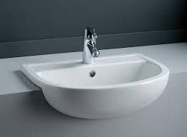Sink is finished on all sides. Rak Compact Semi Recessed Basin 450mm 550mm Also Available