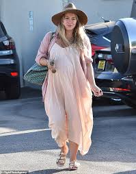 A photo was snapped, and social media went crazy! Hilary Duff Wraps Growing Baby Bump In Flowing Pink Maternity Dress While Running Errands In La Daily Mail Online