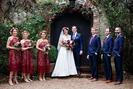 Autumnal Village Wedding With Deep Red Blue Colour Scheme At Ramster Hall Surrey Watters Bridal Gowns Red Wedding Dresses Deep Red Bridesmaid Dresses