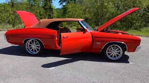 The new car had 4 headlights flaired into the front facia surrounding a big formal grille separated horizontally by the 'chevy bar', and square taillights set into. Custom Built 1970 Chevrolet Chevelle Ss 454 Convertible
