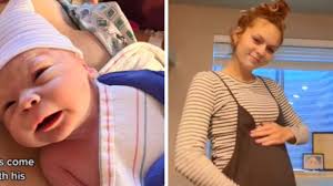 Woman shares photo of newborn son clutching her IUD