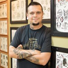 We are a tattoo shop located in the west end of richmond, va. Bio Temple Tattoo Piercing