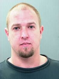 Cops: Drunk man used clothes to clog holding cell toliet