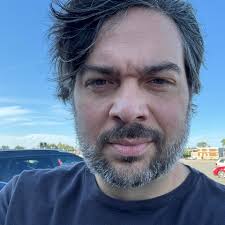 What is the benefit of having a high action ? I like mine to be as low as  possible. Just wondered why some people prefer a high action.