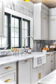 Antique Brass Pulls On Light Gray Shaker Kitchen Drawers Transitional Kitchen Grey Shaker Kitchen Kitchen Renovation Light Grey Kitchens