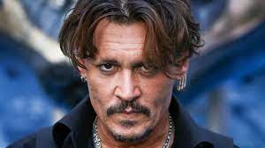 Depp's first film role was in the horror film a nightmare on elm street (1984), in which he played the boyfriend of the main character and one of freddy krueger's victims. Johnny Depp Loses Wife Beater Libel Case Against The Sun Over Amber Heard Allegations Ents Arts News Sky News