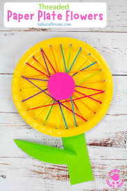 Trim the plate to create petals and then let them have at it with crayons, paints, or markers to make a paper plate flower. Threaded Paper Plate Flowers Kids Craft Room