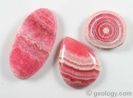 Look for imperfections in the crystal's texture. Rhodochrosite Manganese Ore Gemstone Mineral Specimen