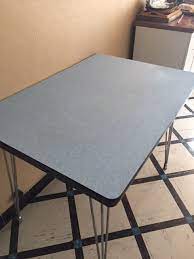 A dining, kitchen or similar table whose top is surfaced with the plastic laminate called formica. Table Formica Luckyfind