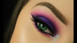 green eyes pop purple smokey eye