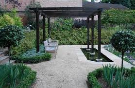 Black Pergola Looks Great With The Deep Green Planting English Country Gardens English Landscape Garden Garden Design
