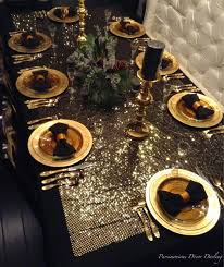 Black And Gold Table Set Up A Gilded Golden New Year S Eve Tablescape Idea Glittery Gold And Black Bow Tie Napk New Years Eve Decorations Gold Christmas Decorations Black Gold Christmas