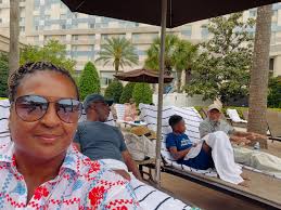 Day 1 Spring Break- Chilling by the pool having lunch and enjoying the  beautiful weather. We spent the evening at Top Golf. So happy to have my  dad here with us! #orlandoflorida #