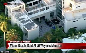 Lil' wayne buys stunning house in miami for $17 million. Lil Wayne S Miami Beach Mansion Raided By Police As They Seize Assets Daily Mail Online