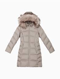 Faux Fur Hood Down Blend Longline Puffer Coat Calvin Klein Faux Fur Hood Faux Fur Hooded Coat Puffer Coat Variations include the addition of faux fur, hoods, and pocket styles from snap button to smooth. faux fur hood down blend longline