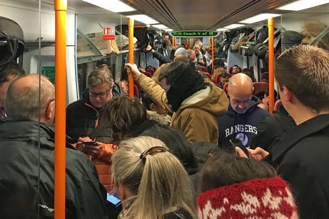 Should noisy train passengers playing loud music be fined? Take our poll and have your say - AOL