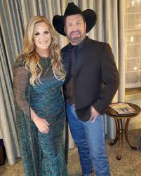 Garth Brooks' wife Trisha Yearwood displays incredible slimmed-down  physique in mini dress and fishnet tights – wow | HELLO!