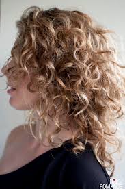 Twist the hair once in a barrel, wrap it loosely around the tong, and leave it for a few seconds. The Best Haircuts For Curly Hair Hair Romance