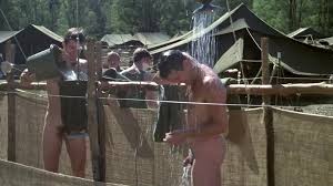 Naked actors shower in a military camp - ThisVid.com