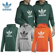 The adidas logo is so widespread and familiar that it's almost impossible to believe that the iconic three stripes once belonged to a completely different company. Adidas Originals Trefoil Hoody Kapuzen Pullover Sweat Sport Grun Grau Orange Neu Ebay