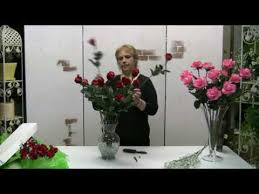 Real touch flowers can be washed in warm sudsy water and rinsed, shake and leave to dry. How To Arrange A Dozen Real Touch Roses In A Clear Vase Youtube