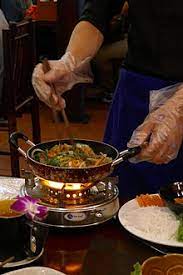 These are slow cooked into a stew spiced with cinnamon, cardamom, coriander seeds, cumin seeds, cloves, nutmeg and more spices, and served alongside caramelized rice. Vietnamese Cuisine Wikipedia