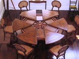 Visually, it seems to occupy less space than a rectangle because of the rounded corners, but this also means that it has less surface area. 15 Stunning High End Dining Table Design Ideas Round Dining Room Table Round Dining Room Wooden Dining Room Table
