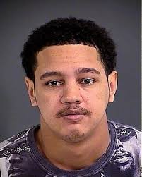 Police search for suspect after restaurant parking lot shooting kills teen