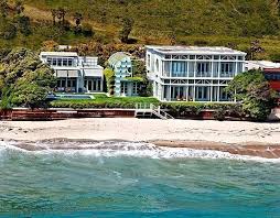 Jim Carrey Lists Malibu Colony Beach House At 13 95 Million Contemporary Beach House Celebrity Houses Malibu Homes