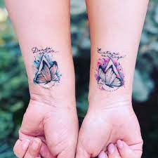 Whether It S On The Ankle Or Wrist These Pictures Of Flowers Hearts Quotes And Even Disney Mother Tattoos For Daughters Mom Daughter Tattoos Friend Tattoos
