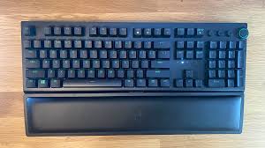 The keyboard's backlight is currently blue. Razer Blackwidow V3 Pro Wireless Mechanical Gaming Keyboard Review Pcmag