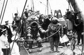 A diving suit is a garment or device designed to protect a diver from the underwater environment. Into The Abyss 20 Fascinating Vintage Deep Sea Diving Photos
