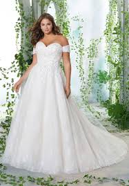 When it comes to colors, anything from white, ivory, champagne to light gold or pink, you can find the option that complements your skin tone. Petunia Plus Size Wedding Dress Morilee