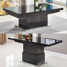 A glass coffee table makes for an elegant, subtle addition to the room, while a coffee table with storage is perfect for creating space for a striking centerpiece. Elgin Convertible And Extendable Glass Dining And Coffee Table In Black High Gloss Will Loo Coffee Table To Dining Table Convertible Coffee Table Dining Table