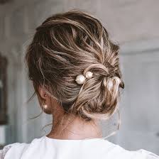 Whether they're braided or twisted, worn low or high, you really can't go wrong with adding this sweet look to your styling repertoire. 21 Easy Updos For Short Hair Cute Bun Updo Ideas L Oreal Paris