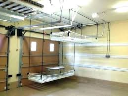 These overhead hanging storage shelves hide the mess with. Ceiling Shelves Room Pictures All About Home Design Furniture
