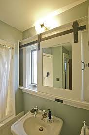 Slide To Hide The Mirror Bathroom Mirrors Diy Bathroom Windows Small Basement Bathroom