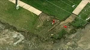 massive sinkhole in fraser, michigan