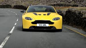 Image result for Sunburst Yellow 2012 Aston Martin