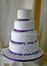 If you are a daring bride, you can rock a purple wedding dress, for example, a strapless wedding gown, the design should be simple because you will already make a statement with the color. Wedding Cake Simple But Cute And It S Purple Purple Wedding Cakes Lavender Wedding Cake Elegant Wedding Cakes